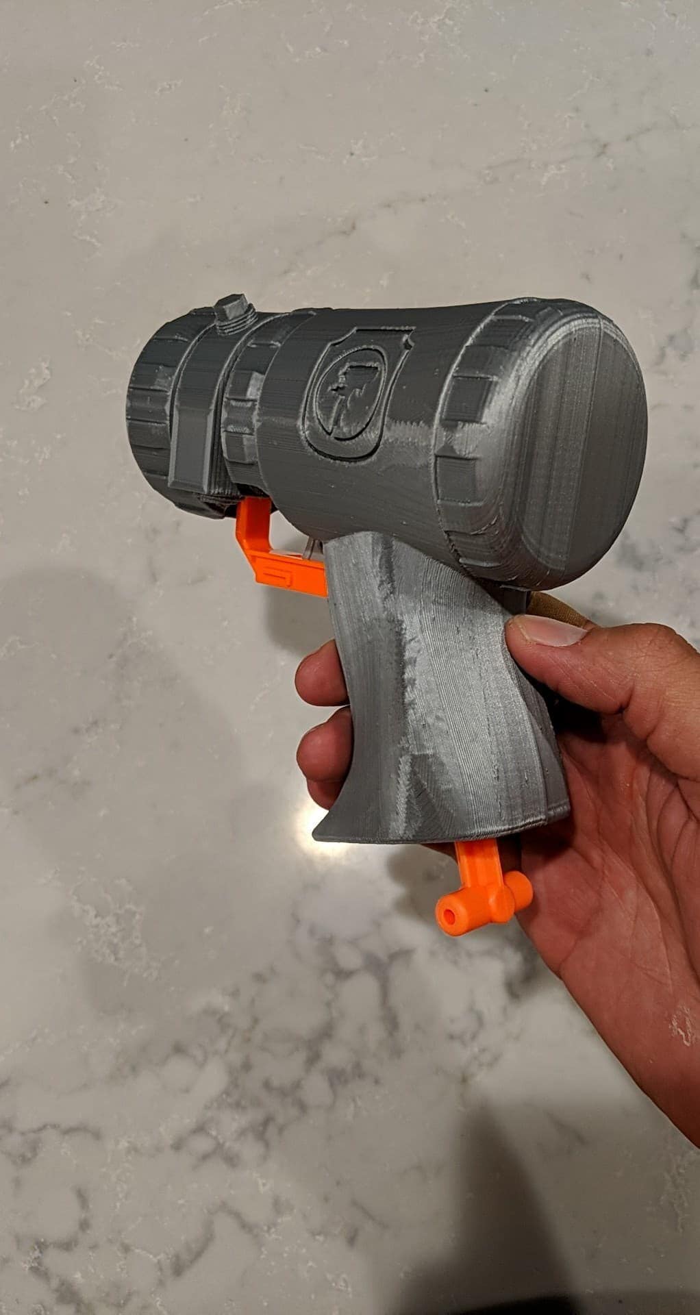 Grey shell with orange accents